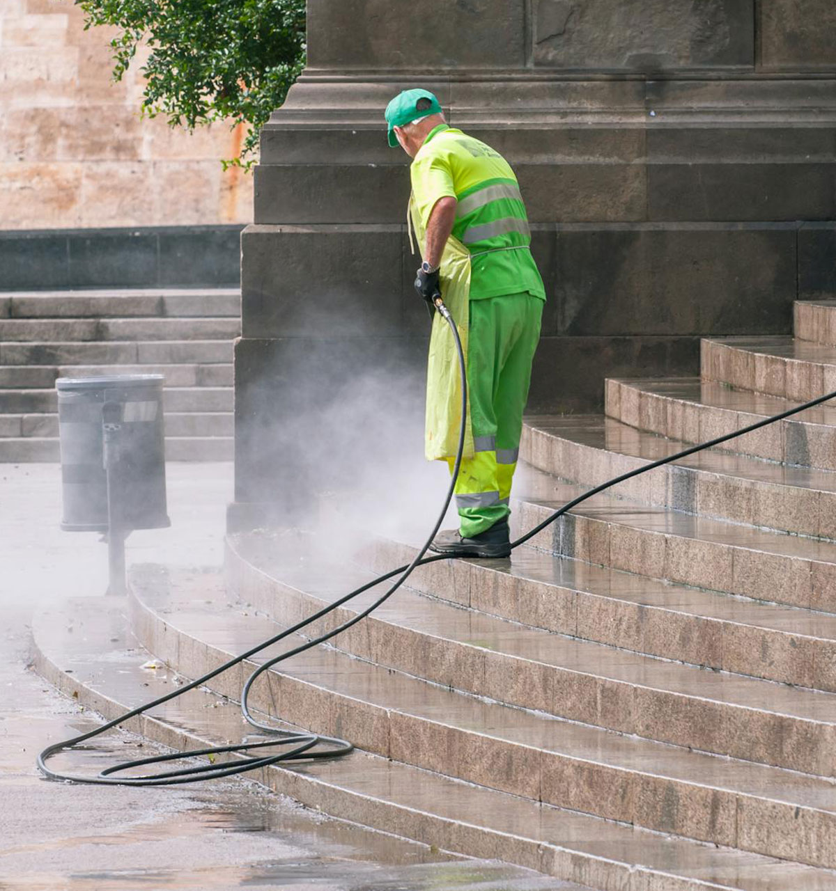 Man cleaning the outside staircase