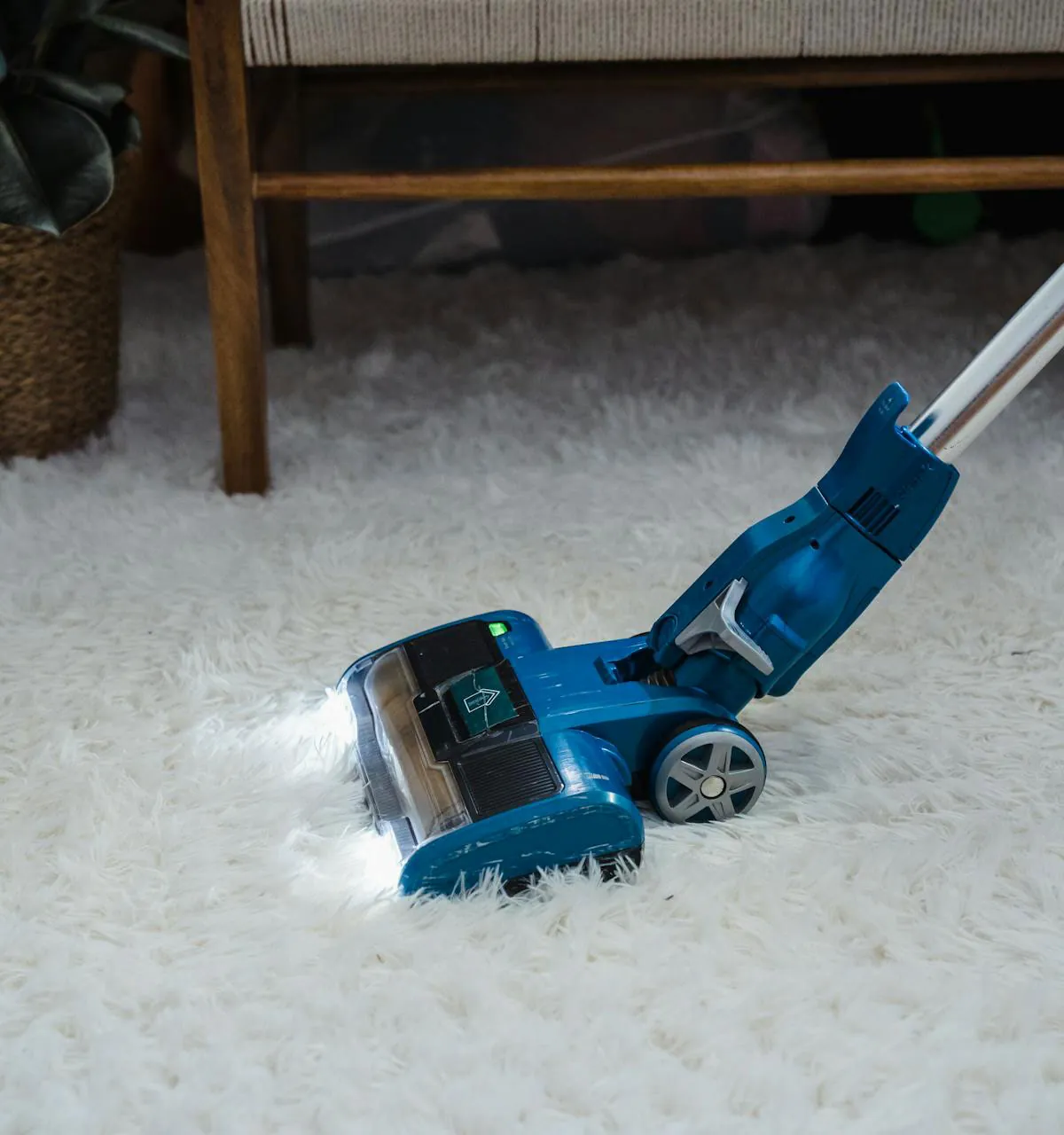 Vacuum on white carpet