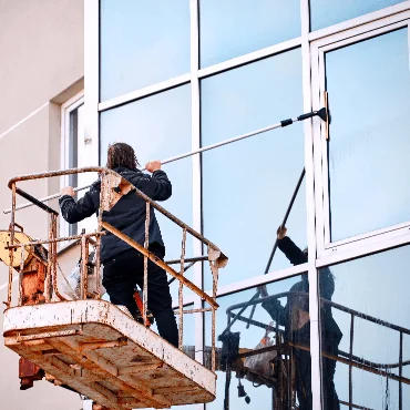 Window washer on the side of the building