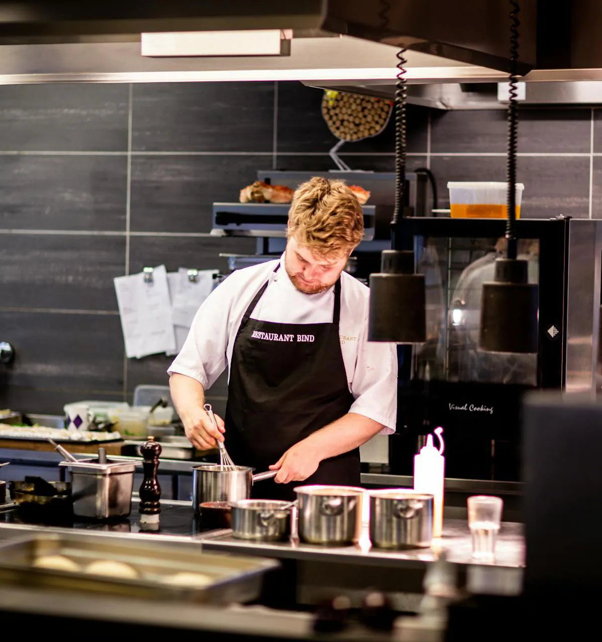 Chef cooking in a commercial kitchen